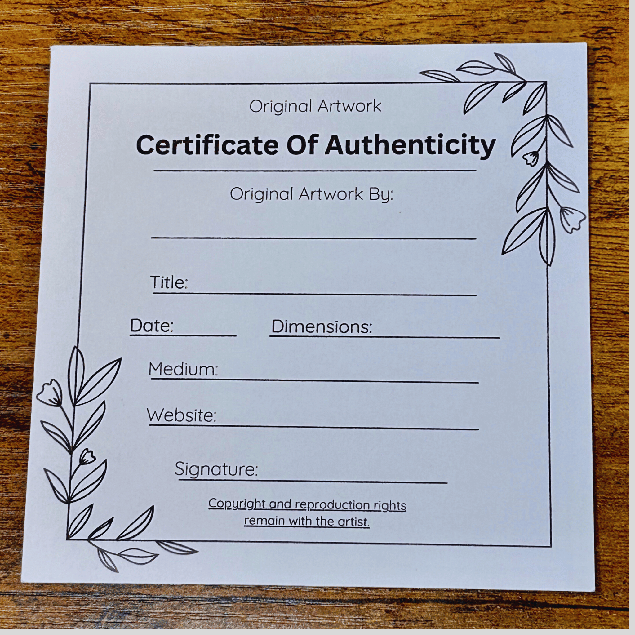 Certificate of Authenticity form on a wooden surface
